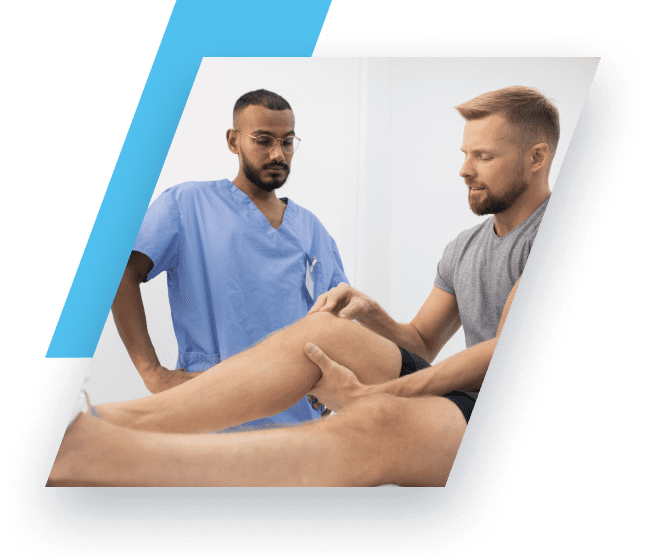 Doctor looking at a patients knee