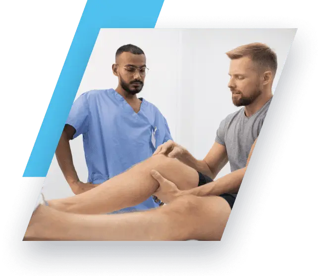 Doctor looking at a patients knee