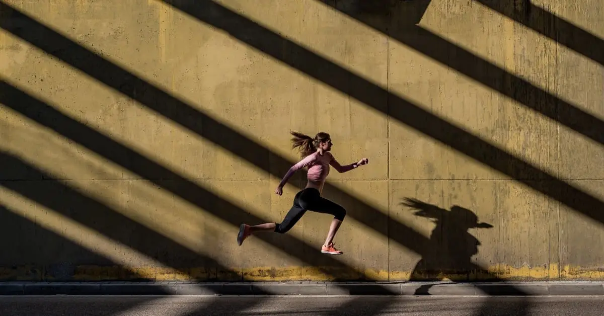 woman running on the road
