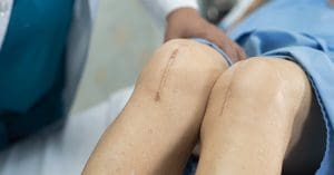 post-operative patient on an examination table