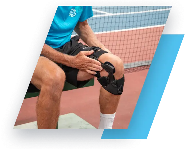 Pickleball player wearing knee brace