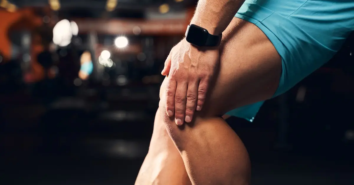 man holding knee