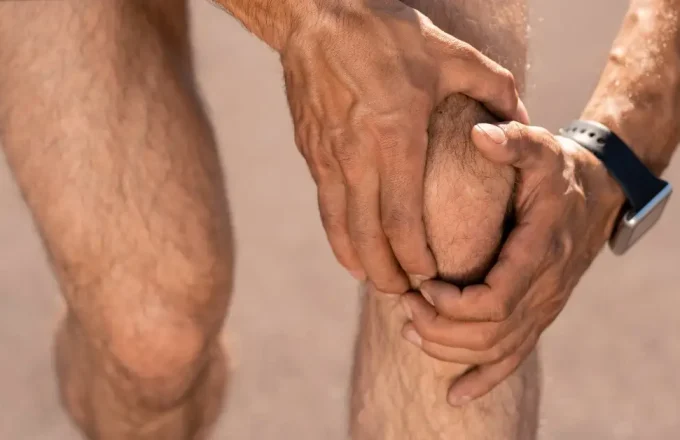 holding knee