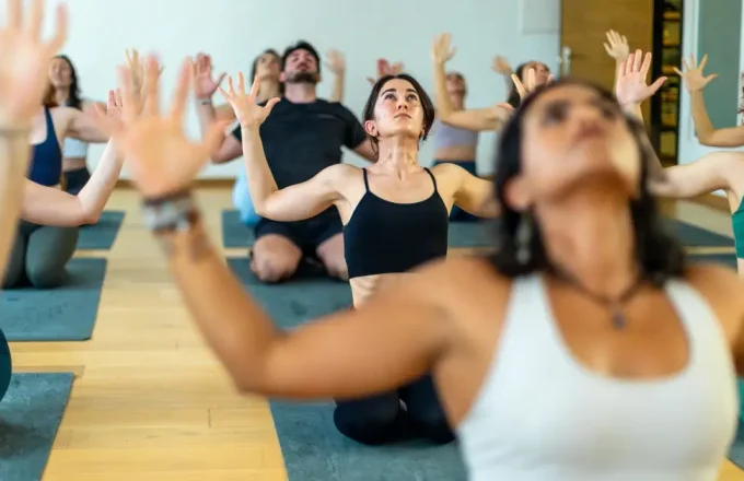 group of women doing yoga